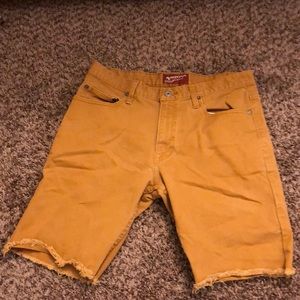 Tan cut-off shorts by Arizona Jean Co